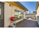 Rooftop deck with outdoor furniture, grill, and views of the city skyline at 2426 Welton St, Denver, CO 80205