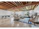 Finished basement includes a billiards table, sitting area, and workout space at 5309 Mining Camp Trl, Parker, CO 80134