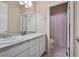 Bathroom with double vanity and a shower and toilet in a separate space at 5309 Mining Camp Trl, Parker, CO 80134