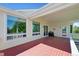Large wooden deck with a covered area and ample space for outdoor seating at 5309 Mining Camp Trl, Parker, CO 80134