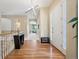 Bright foyer with hardwood floors and an open layout providing access to multiple rooms of the home at 5309 Mining Camp Trl, Parker, CO 80134