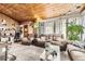 Comfortable living room with a wood-burning stove, creating a cozy and inviting atmosphere at 2220 Lee St, Lakewood, CO 80215