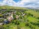 A home in a beautiful neighborhood surrounded by lush greenery and scenic views at 14023 W Alaska Dr, Lakewood, CO 80228
