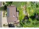 An aerial view of the home showing the roof, solar panels and landscaping at 14023 W Alaska Dr, Lakewood, CO 80228