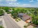Beautiful home with solar panels, landscaping, basketball hoop and mature trees at 14023 W Alaska Dr, Lakewood, CO 80228