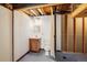 Basement bathroom with vanity, toilet, and shower at 14023 W Alaska Dr, Lakewood, CO 80228
