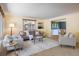 Neutral living room showcasing modern furniture, and an open floor plan at 14023 W Alaska Dr, Lakewood, CO 80228