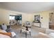 Open living room providing seamless flow between living and dining spaces, designed for hosting and entertaining at 14023 W Alaska Dr, Lakewood, CO 80228