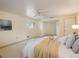 Light-filled main bedroom with a ceiling fan, generous space, and comfortable atmosphere at 14023 W Alaska Dr, Lakewood, CO 80228