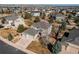This aerial view shows a beautiful house in a well-planned neighborhood at 16590 Hitching Post Cir, Parker, CO 80134