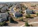 An aerial view shows a backyard with a fenced-in yard at 16590 Hitching Post Cir, Parker, CO 80134