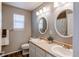 Well-lit bathroom with double vanity, dual sinks, wood-style flooring and great lighting at 16590 Hitching Post Cir, Parker, CO 80134