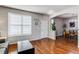 Cozy living room with hardwood floors, natural light, and an open floor plan at 16590 Hitching Post Cir, Parker, CO 80134