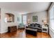 This living room has lots of decor and hardwood flooring at 16590 Hitching Post Cir, Parker, CO 80134