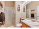 Bathroom featuring a glass enclosed shower and modern fixtures at 1374 Spotted Owl Way, Highlands Ranch, CO 80129