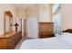 Bright bedroom featuring natural light, neutral walls, and traditional furnishings at 1374 Spotted Owl Way, Highlands Ranch, CO 80129