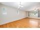 Spacious dining area with hardwood floors, providing ample space for gatherings and meals at 260 Flint Way, Broomfield, CO 80020
