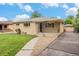 Charming single-story home with a well-maintained lawn and inviting front porch at 260 Flint Way, Broomfield, CO 80020