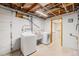Unfinished laundry room with lots of exposed pipes and an open concept at 260 Flint Way, Broomfield, CO 80020