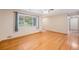 Bright and open living space featuring hardwood floors and large windows for natural light at 260 Flint Way, Broomfield, CO 80020