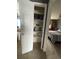 Open closet, door ajar, leading to bedroom at 6585 W 84Th Way # 109, Arvada, CO 80003