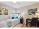 Well-lit bedroom with a twin bed and workspace at 3311 S Logan St, Englewood, CO 80113