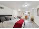 Cozy bedroom with a queen bed and built-in kitchenette at 3311 S Logan St, Englewood, CO 80113