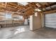 Attached garage with additional storage and workbench at 3311 S Logan St, Englewood, CO 80113