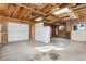 Large garage with extra storage cabinets and shelving at 3311 S Logan St, Englewood, CO 80113