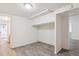 Spacious room with grey flooring and built-in shelves at 3311 S Logan St, Englewood, CO 80113