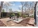 Charming backyard patio area with outdoor seating and gravel at 3740 W 54Th Ave, Denver, CO 80221