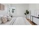 Bright bedroom with hardwood floors, large windows, and neutral décor at 3740 W 54Th Ave, Denver, CO 80221