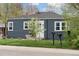 Inviting home with a neatly landscaped front yard, a decorative tree, and dual mailboxes on display at 3740 W 54Th Ave, Denver, CO 80221