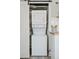 Stacked white washer and dryer unit conveniently located in the kitchen area at 3740 W 54Th Ave, Denver, CO 80221