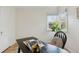 Bright office featuring hardwood floors, natural light from the bay window, and a comfortable chair at 3740 W 54Th Ave, Denver, CO 80221