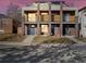 Modern townhome with brick facade, balconies, and clean architectural lines at 845 Eudora St, Denver, CO 80220