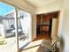 Cozy kitchen with hardwood floors, wood cabinetry, and views to the backyard at 1716 Virginia St, Idaho Springs, CO 80452