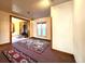 Open living room with natural light, wood trim and an area rug at 1716 Virginia St, Idaho Springs, CO 80452