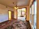 Inviting living room with windows, area rug, and an open doorway at 1716 Virginia St, Idaho Springs, CO 80452