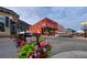 Street view of historic building with outdoor seating and mountain views at 1716 Virginia St, Idaho Springs, CO 80452