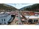 Lively downtown street scene with shops, restaurants, and mountain backdrop at 1716 Virginia St, Idaho Springs, CO 80452