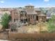 A full view of this home's roof and backyard at 8044 E 24Th Ave, Denver, CO 80238