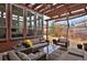 Relaxing outdoor patio with a pergola, comfortable seating, and garden views at 8044 E 24Th Ave, Denver, CO 80238
