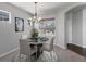 Bright dining room with chandelier and table setting at 1428 S De Gaulle Ct, Aurora, CO 80018