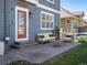 Back patio with seating area, adjacent to house at 1428 S De Gaulle Ct, Aurora, CO 80018