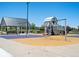 Community playground with playset, swings, and covered area at 1428 S De Gaulle Ct, Aurora, CO 80018