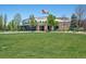 Murphy Creek K-8 school building, with large grassy area at 1428 S De Gaulle Ct, Aurora, CO 80018