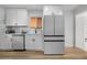 Sleek kitchen featuring stainless steel appliances, modern cabinets, and eat in kitchen at 3541 Eudora St, Denver, CO 80207
