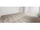 Spacious bedroom featuring clean carpeting with neutral colored walls at 7267 Prairie Sage Pl, Littleton, CO 80125