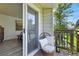 Cozy balcony featuring a comfortable chair with cushions, offering a private outdoor space with a calming view at 6795 E Arizona Ave # B, Denver, CO 80224